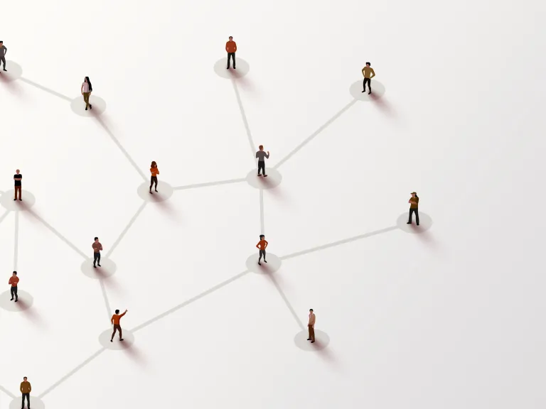 Graphic of miniature figurines connected by lines on a white background