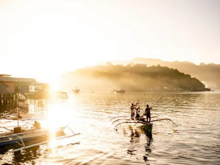 A small port near Coron, Philippines, where local fishers bring their catch to sell to local buyers. Jason Houston for USAID.